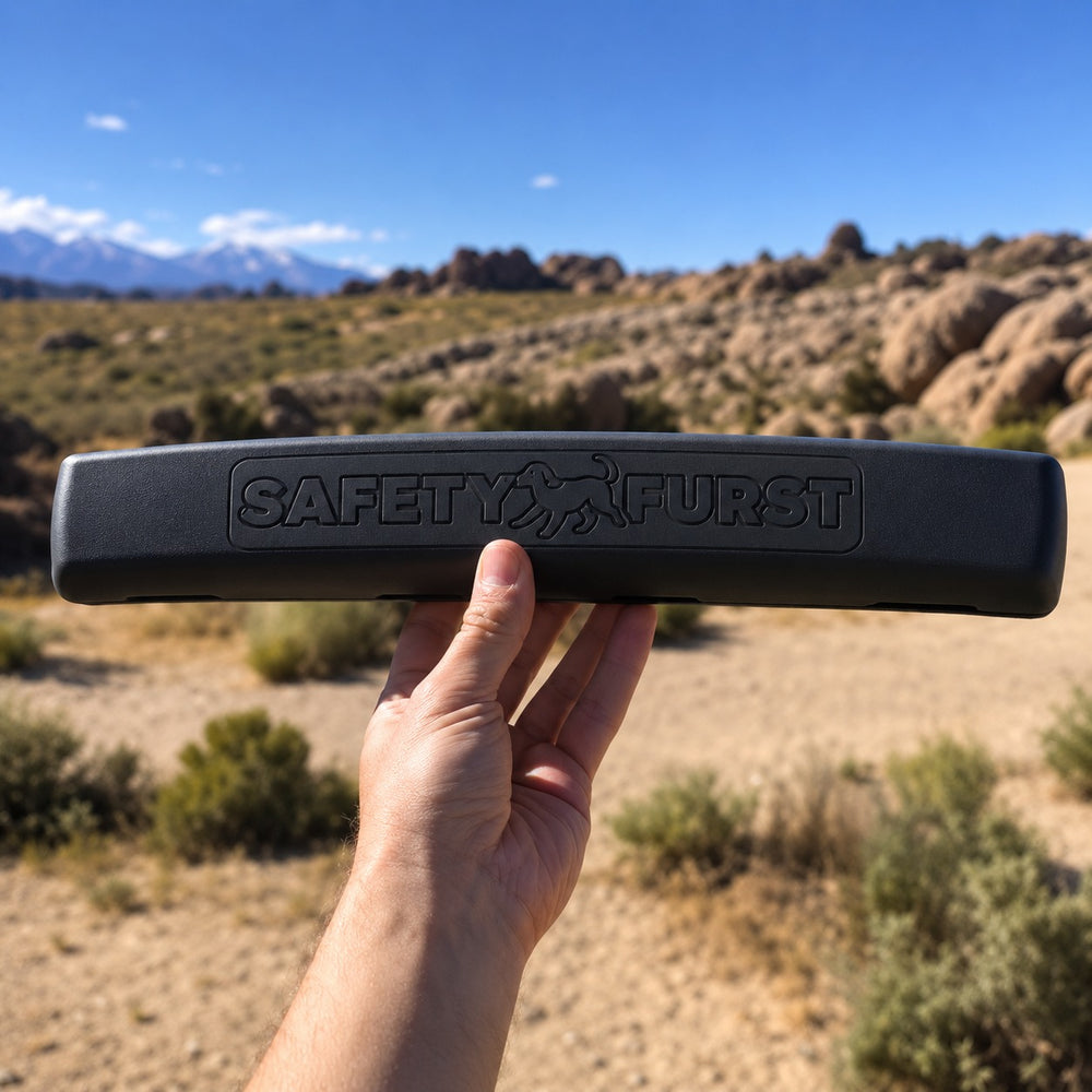 PupRest car window cushion held in hand outdoors