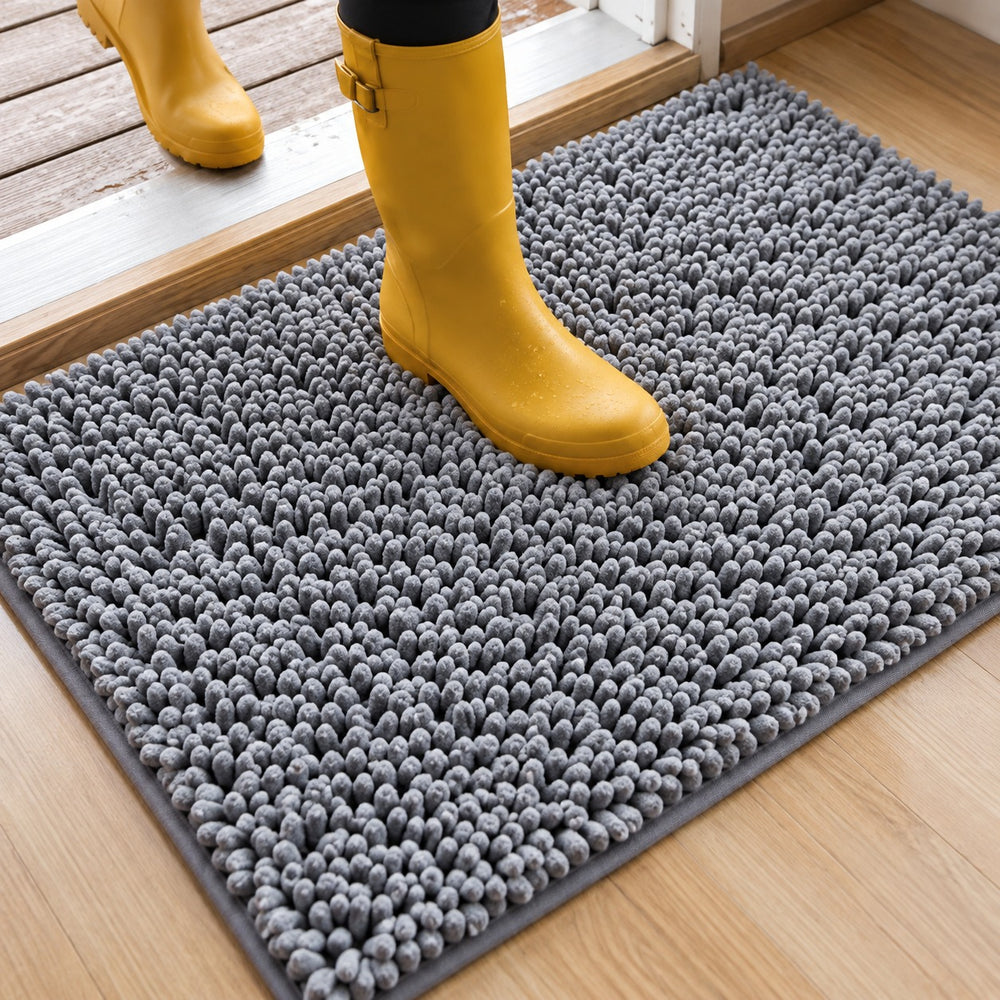 MudStop mat at a back doorway catching mud from boots and paws